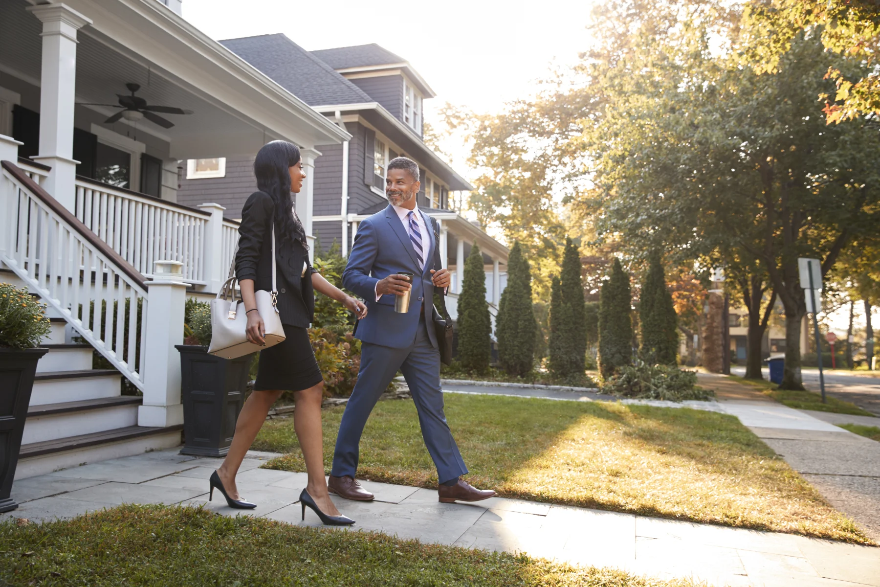 professionals-strolling-near-suburban-house-during-2026-03-10-03-18-32-utc